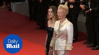 Tilda Swinton holds hands with daughter at Parasite premiere