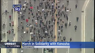 Hundreds Of Protesters March Through Downtown Minneapolis