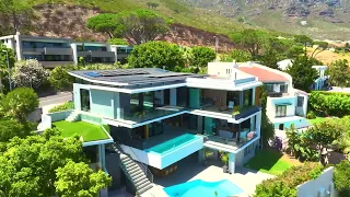 Unrivaled Luxury in this truly Exquisite 3-Story Home in Prime Camps Bay.