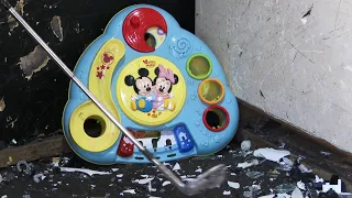 Smashing a Mickey Mouse Toy Thing