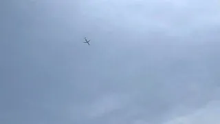 Delta Flying approach Overhead Mitsubishi CRJ-900.