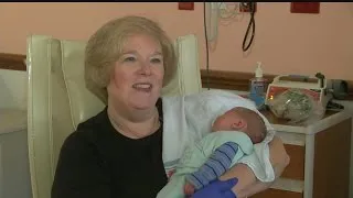 Volunteers cuddle with newborns at Akron Children’s Hospital