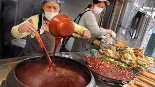 Sweetly spicy cauldron tteokbokki snack bar made by a happy Korean family! - Korean street food