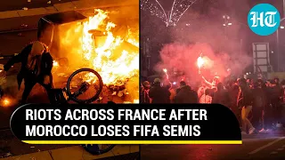 French fans throw fireworks at riot police, clash with Moroccans as France reaches FIFA finals