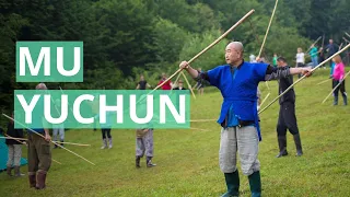 Gymnastics with a stick for the neck and shoulder girdle. Mu Yuchun.