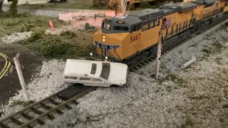 Train Hits Car, in N scale! The Dangers of Racing a Train (Railroad Crossing Safely)