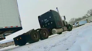 Snowy Pickup And A Drop In A Straight Piped Peterbilt 389