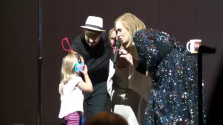 Adele with child and  her moms