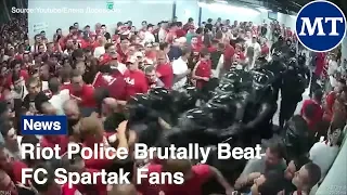 Riot Police Brutally Beat FC Spartak Fans  | The Moscow Times