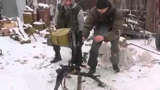 Ополченцы ДНР обстреливают из АГС силы АТО 19 02 15