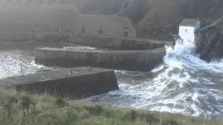 Porthgain harbour (Pembrokeshire, Wales) in stormy sea