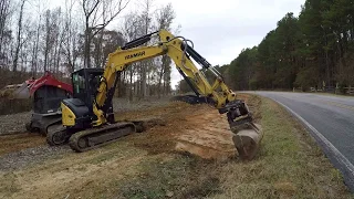 1000' Ditch Cleaning And Road Grading