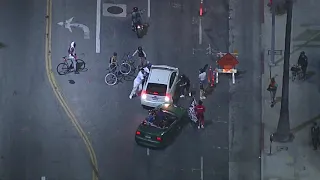 Driver attacked after driving through protest crowd in Hollywood | ABC7 Los Angeles