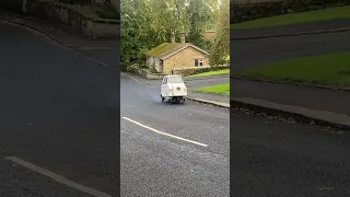 Mini Comtesse arriving at The Crown, it was the second smallest production car after the Peel P50