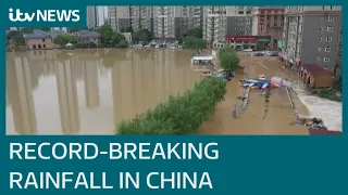 Flooding in China turns streets to rivers after 'heaviest rainfall in 1,000 years' | ITV News
