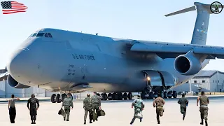 Crew of a U.S. C-5 Super Galaxy scrambled to take off at full throttle for the Middle East