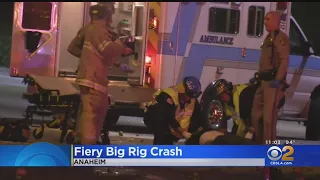 Officers Take Up Fire Extinguishers To Rescue Driver From Burning Big Rig