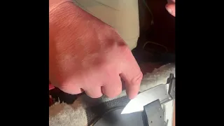 Sharpening a Hinderer Spanto using a guided system.