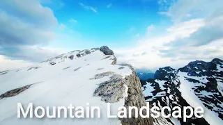 Drone Footage Of A Mountain Landscape With Snow! Free download