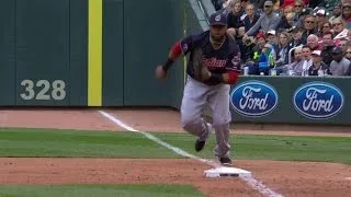 CLE@MIN: Santana dives to grab grounder, runs to bag