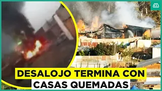 Desalojo en campamento en Cerro Navia: Casas de terrenos terminan quemadas
