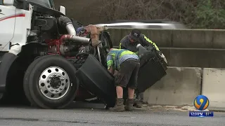 Tractor-trailer driver charged after crash shuts down I-85 for hours