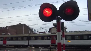 Four trains at railroad crossing of Gdańsk, Poland/Keturi traukiniai Gdansko pervažoje, Lenkijoje