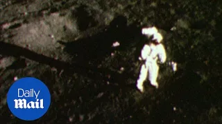 Richard Gordon orbits as the Apollo 12 team lands on the moon - Daily Mail