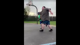 two fat people run a race! Big guy falls hard