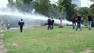 Dutch police use water cannon to disperse The Hague protest