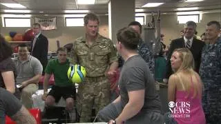 Prince Harry visits wounded service members at Walter Reed