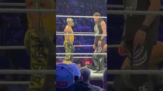 Dominik Mysterio pushes Rey Mysterio during match #wwe #reymysterio #dominikmysterio