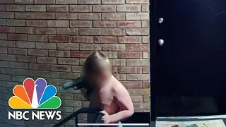 Security video shows toddler waving around loaded gun