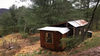 Build a hermitage cabin around an RV / Camper