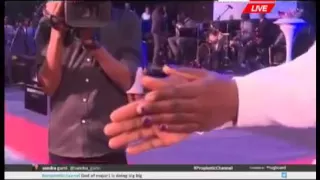 Bushiri hand straightening miracle  a lady 's hands becoming equal to each other