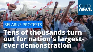 Belarus protests: Tens of thousands turn out for nation's largest-ever demonstration