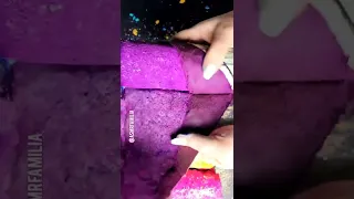 Unwrapping a purple gym chalk cylinder