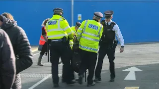 Arrests as Extinction Rebellion activists disrupt London airport | AFP