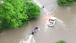 Man flying drone helps rescue woman in high waters in Willis