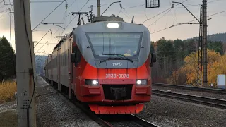 Trains in Siberia in golden autumn. Goncharovo - Bolshoy Lug stretch. Russia. Irkutsk region.