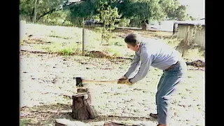 President Reagan chopping wood with axe at Rancho Del Cielo on November 27, 1982