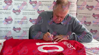 Geoff Hurst signing shirts for Allstarsignings