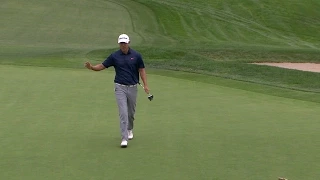 James Hahn buries his putt from the bottom of the green at Farmers