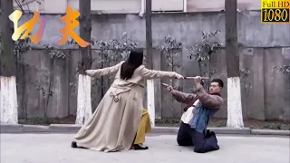 Kung Fu Movie! The young man arrogantly challenges a Kung Fu girl, only to be defeated by her.