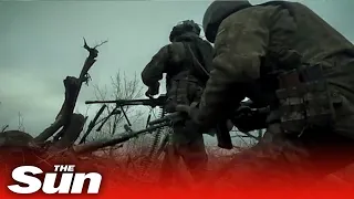 Ukrainian soldiers exchange fire with Russian fighters on the frontline