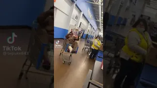 Man in Shopping Cart Throws Milk and Screams