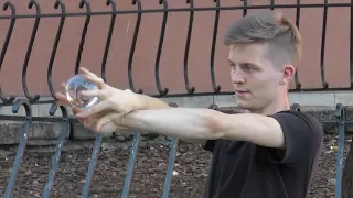 Floating Magic Crystall Ball Illusion. Contact Juggling Seen in Warsaw, Poland.