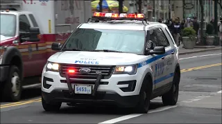 NYPD Police car responding with horn, siren and lights