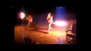 epic fire sword fight accompanied by epic music