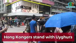 Hong Kongers stand with Uyghur